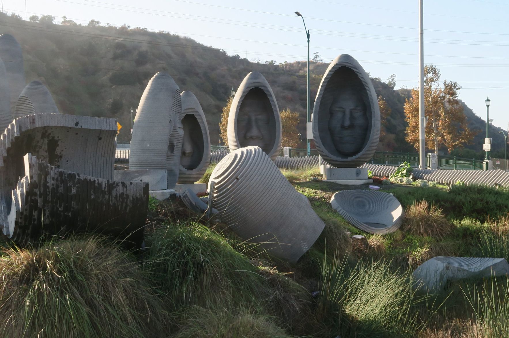 Damaged Cypress Park roundabout art artwork statues Jesus Sanchez 11-29-2019 4-09-57 PM.JPG